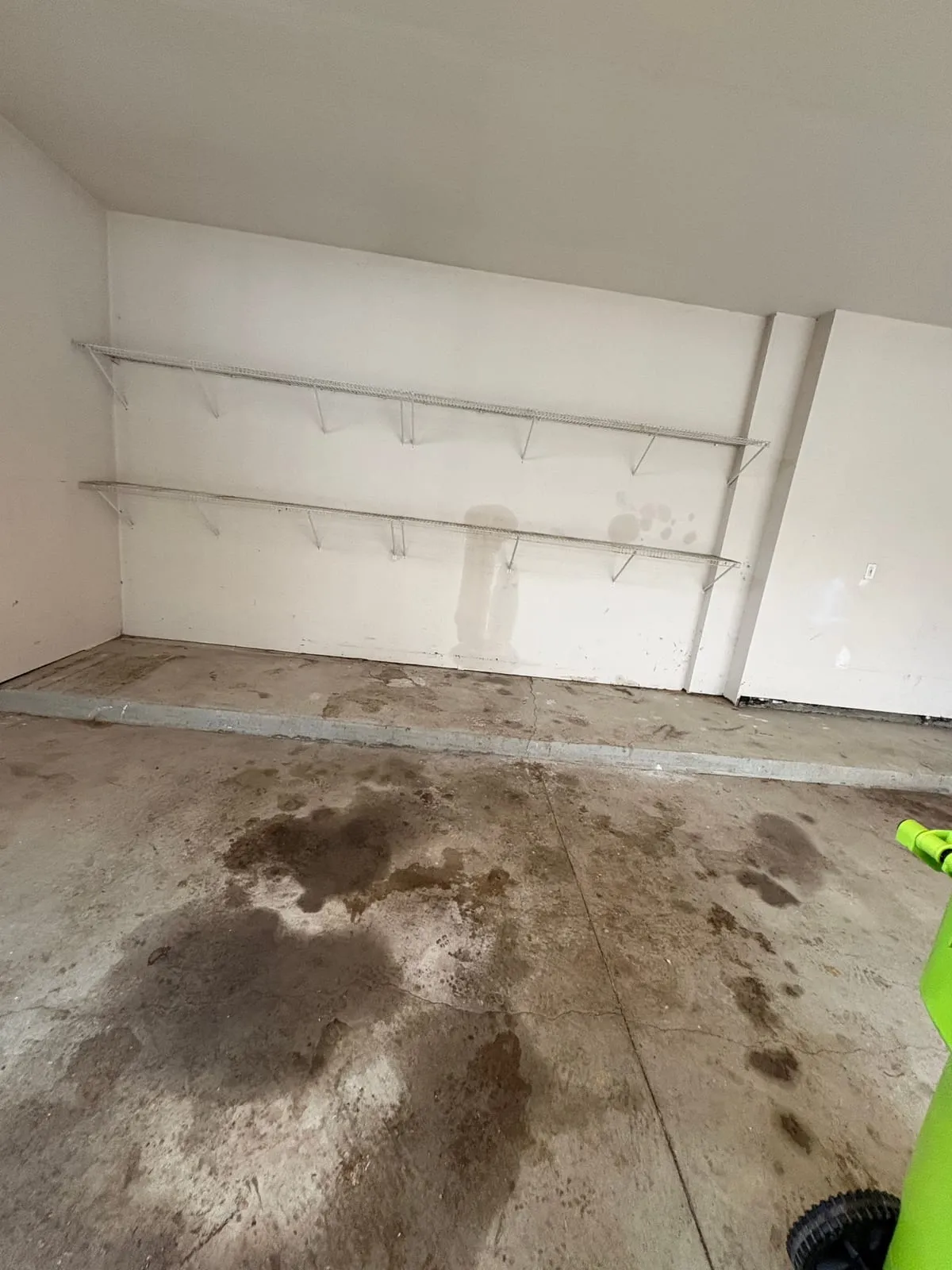 The same garage emptied down to clean walls and floor