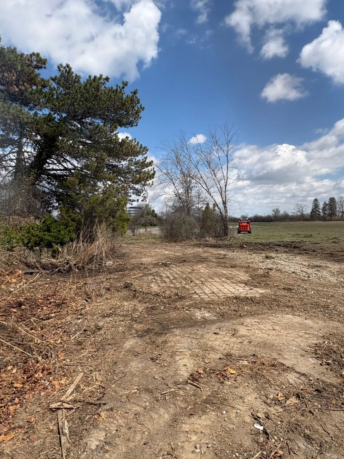 The same lot cleared to bare, level ground