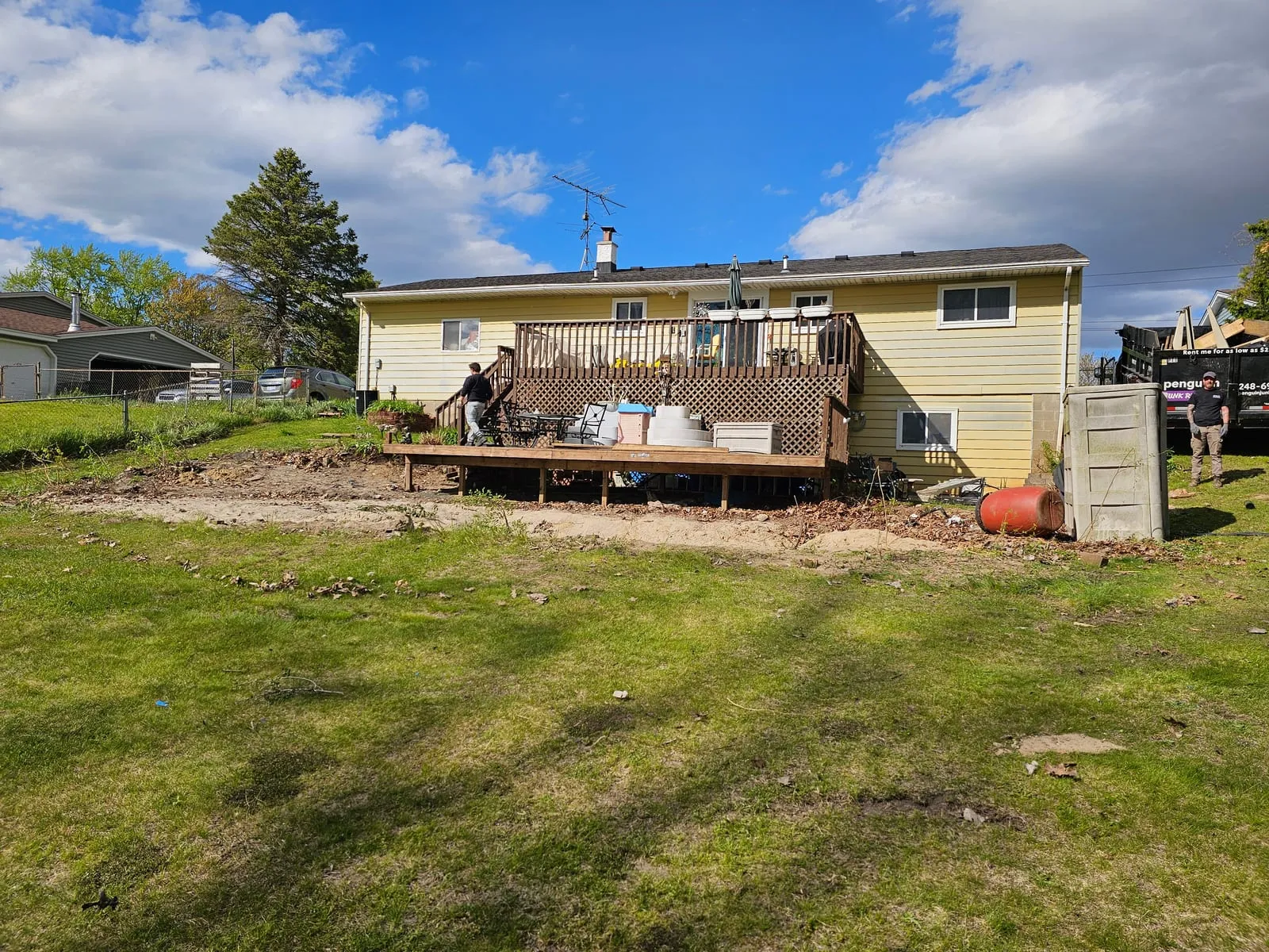 The same yard with the pool and deck gone, down to bare ground
