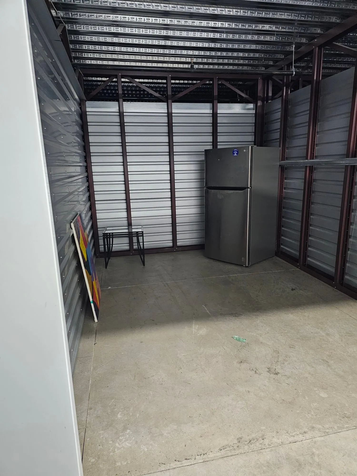 Storage unit holding a refrigerator and household goods before a cleanout